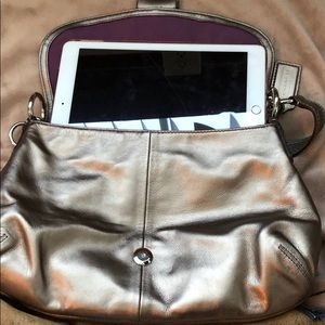 Metallic gold coach bag